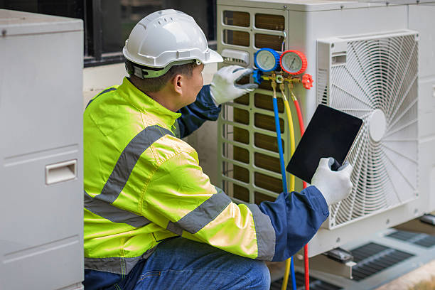 Professional Heat Pump Repair technician working in Miamitown, OH